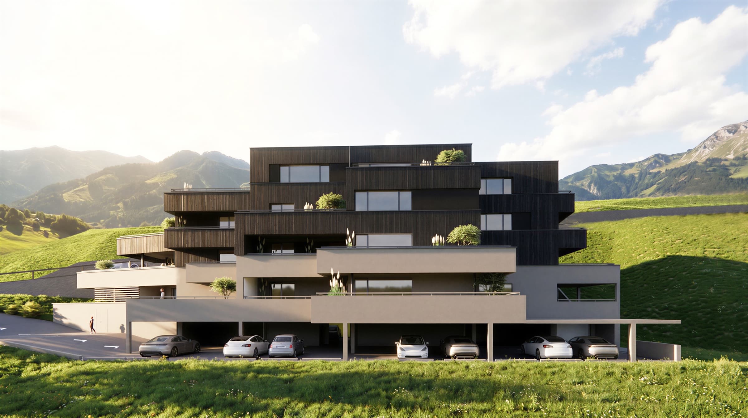 GAIMBERG TERRASSEN — Frontansicht der Wohnanlage vor den Lienzer Dolomiten
